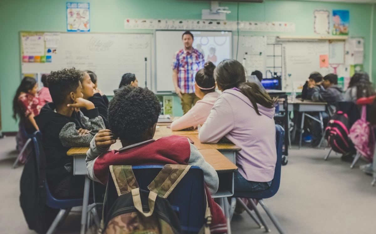 Students listening attentively in a classroom